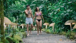 Couples walks through Senderos in Ecotermales Hot Springs