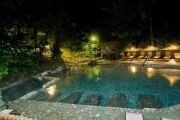 Night view of pools at Ecotermales Hot Springs
