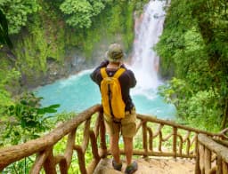 tourist taking picture on Rio Celeste Tour